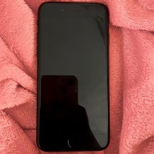 iPhone SE, color black, 2 years old.